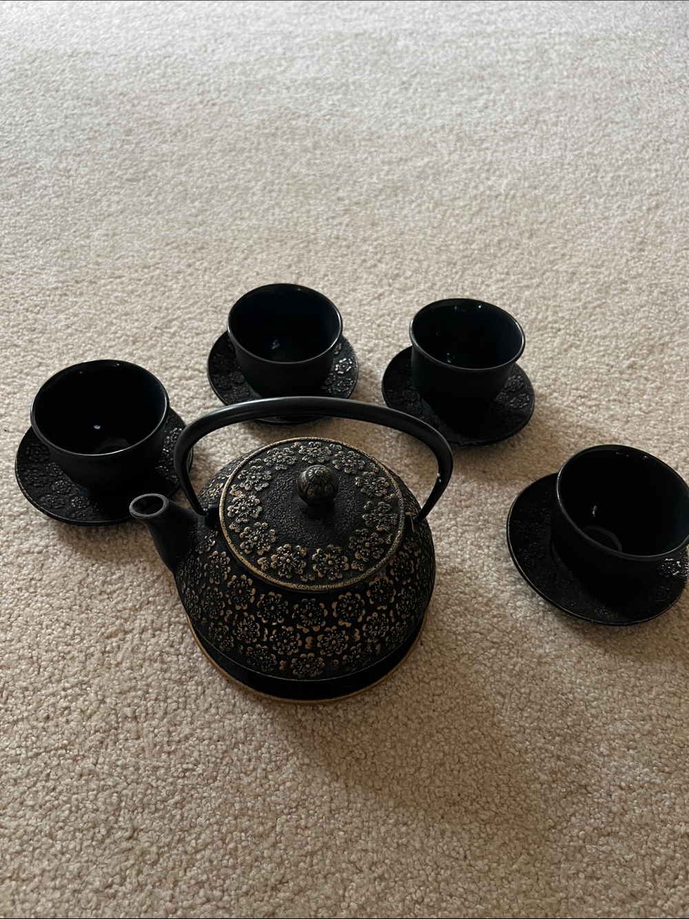Teavana Black and Gold Cast Iron Teapot Set with Four Cups and Saucers